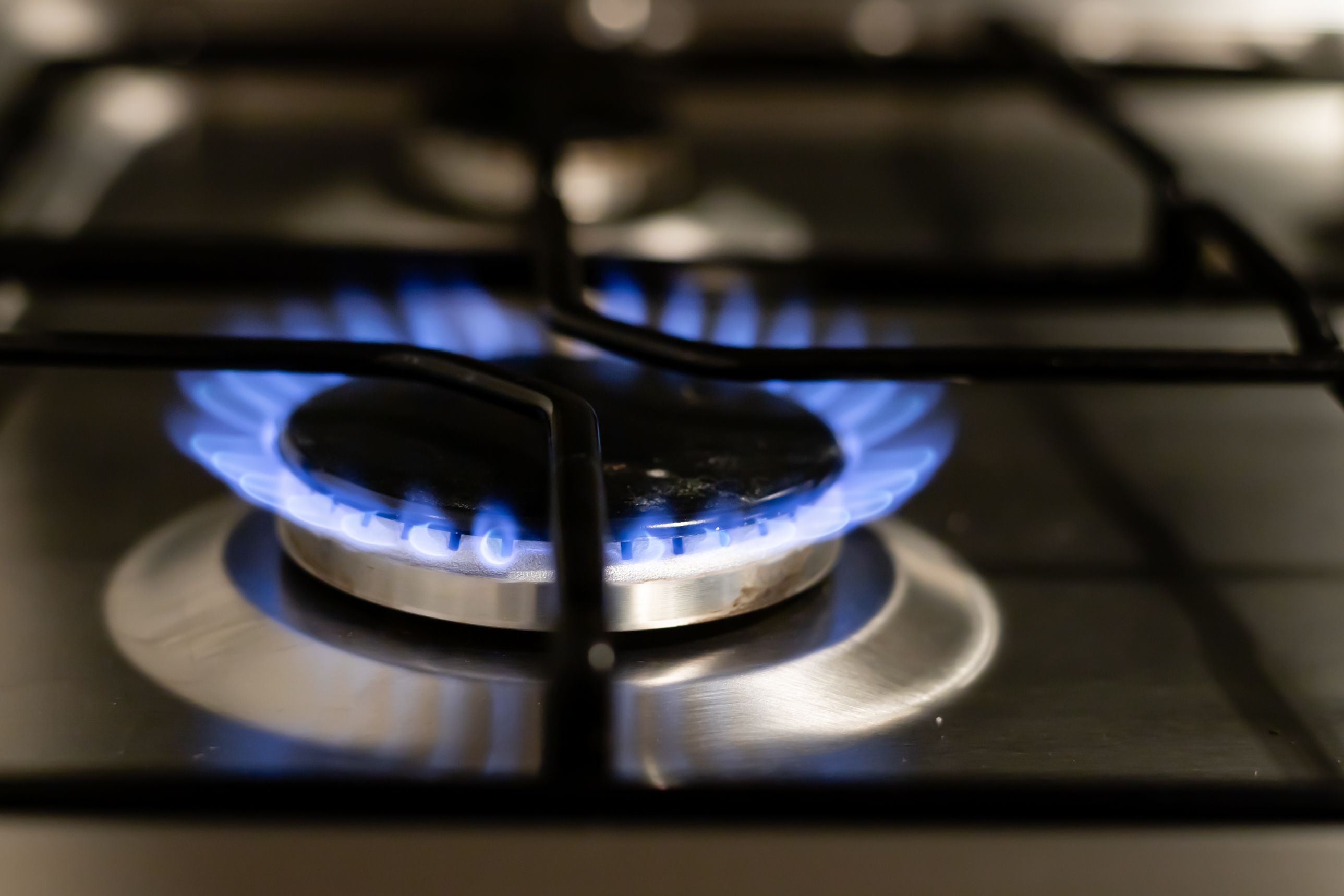 Gas stove repair & service technician at work